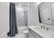 Modern bathroom with a shower-tub combo, stylish vanity, and contemporary fixtures, offering a clean and comfortable space at 3832 Noremac Dr, Raleigh, NC 27612