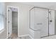 Walk-in shower with glass surround and subway tile in a modern bathroom at 3900 Inkberry Ct, Apex, NC 27539