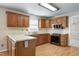 Charming kitchen equipped with stainless steel appliances and overhead lighting at 3900 Inkberry Ct, Apex, NC 27539