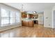 Functional kitchen area with matching wood cabinets and lots of natural light at 3900 Inkberry Ct, Apex, NC 27539