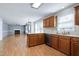 Open layout from kitchen to the living area with lots of natural light and modern appliances at 3900 Inkberry Ct, Apex, NC 27539