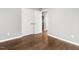 Bedroom with hardwood floors and a closet at 3900 Maplefield Dr, Raleigh, NC 27613