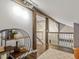 This loft features modern decorations and wooden beams at 3900 Maplefield Dr, Raleigh, NC 27613