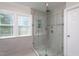 Elegant bathroom featuring a glass-enclosed shower and mosaic tile accents at 3905 Autumn Creek Dr, Fuquay Varina, NC 27526