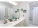 Bright bathroom featuring double sinks and a shower/tub combination at 3905 Autumn Creek Dr, Fuquay Varina, NC 27526
