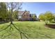 Charming home with a manicured front yard, tree, and mature landscaping at 3905 Autumn Creek Dr, Fuquay Varina, NC 27526