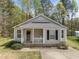 Charming one-story home with a covered front porch and well-maintained landscaping at 420 Feldspar Way, Durham, NC 27703
