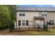This backyard features a patio with black fencing, and provides a semi-private outdoor space at 4523 Tarkiln Pl, Wake Forest, NC 27587
