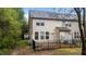 A spacious backyard with a cozy patio, and an iron fence, perfect for outdoor living at 4523 Tarkiln Pl, Wake Forest, NC 27587