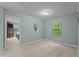 This cozy bedroom with light blue walls leads into another bedroom, creating an airy, connected space at 4523 Tarkiln Pl, Wake Forest, NC 27587