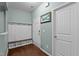 Welcoming foyer with convenient coat rack and mudroom bench seating at 4523 Tarkiln Pl, Wake Forest, NC 27587