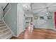 Bright living room with hardwood floors, seamlessly connecting to the kitchen at 4523 Tarkiln Pl, Wake Forest, NC 27587