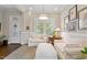 Inviting living room with comfortable seating, a window with blinds, and elegant decor at 463 Old Piedmont Cir, Chapel Hill, NC 27516