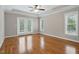 Bright bedroom with hardwood floors, double doors and large windows at 48 Arabella Ln, Clayton, NC 27520
