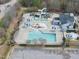 Aerial view of community pool featuring several slides and various water features at 504 Skygrove Dr, Holly Springs, NC 27540