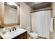 Bathroom features vanity sink, toilet, and tub at 5069 Cokesbury Rd, Fuquay Varina, NC 27526
