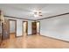Bedroom featuring a neutral color scheme, ceiling fan, and hardwood floor at 5069 Cokesbury Rd, Fuquay Varina, NC 27526