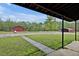 A yard with a shed and house in the background at 5069 Cokesbury Rd, Fuquay Varina, NC 27526