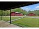 A yard with a shed and a large lawn at 5069 Cokesbury Rd, Fuquay Varina, NC 27526