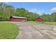 Two outbuildings with ample space and potential, perfect for various needs and hobbies at 5069 Cokesbury Rd, Fuquay Varina, NC 27526