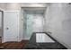 Stunning bathroom featuring an elegant free standing tub and glass enclosed shower with marble finishes at 518 Morgan Creek Rd, Chapel Hill, NC 27517