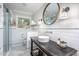 Bright bathroom featuring a modern vanity, vessel sink, subway tile, and a glass-enclosed shower at 518 Morgan Creek Rd, Chapel Hill, NC 27517
