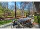 Exterior deck with patio table and seating, perfect for outdoor dining and entertaining at 518 Morgan Creek Rd, Chapel Hill, NC 27517