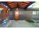 Inviting front entrance features a brick patio and unique details, creating a welcoming ambiance at 518 Morgan Creek Rd, Chapel Hill, NC 27517