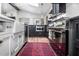 Gourmet kitchen with a professional range, marble counters, and ample storage space at 518 Morgan Creek Rd, Chapel Hill, NC 27517