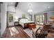Bright main bedroom with hardwood floors, high ceilings and sliding doors to an outdoor deck at 518 Morgan Creek Rd, Chapel Hill, NC 27517