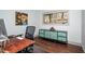 Bright home office featuring hardwood floors, a modern desk, and a stylish accent cabinet at 518 Morgan Creek Rd, Chapel Hill, NC 27517