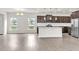 Open kitchen floor plan view from large living space in home at 5712 Agrinio Way, Raleigh, NC 27603