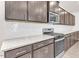 A well-equipped kitchen with modern stainless steel appliances and ample cabinet space at 5712 Agrinio Way, Raleigh, NC 27603