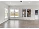 A bright living room filled with natural light and views of the neighborhood at 5712 Agrinio Way, Raleigh, NC 27603