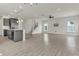 Spacious, open-concept living area with modern finishes and plenty of natural light at 5712 Agrinio Way, Raleigh, NC 27603