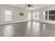 Expansive living room with beautiful hardwood floors and lots of natural light at 5712 Agrinio Way, Raleigh, NC 27603