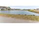 Scenic community pond offering picturesque views and a tranquil setting for residents at 5712 Agrinio Way, Raleigh, NC 27603