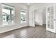 Bright living room with hardwood floors, recessed lighting, and views of the neighborhood at 5712 Agrinio Way, Raleigh, NC 27603