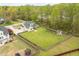 Aerial view of a spacious backyard, complete with a shed and perimeter fencing at 603 Goal Kick Dr, Fuquay Varina, NC 27526