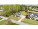 Overhead shot highlighting the home's setting within a mature tree-lined neighborhood at 603 Goal Kick Dr, Fuquay Varina, NC 27526