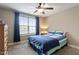 This bedroom has carpeted floors, neutral paint, and a window with natural light at 603 Goal Kick Dr, Fuquay Varina, NC 27526