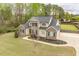 Beautiful two-story home showcasing brick, siding, and a manicured front lawn at 603 Goal Kick Dr, Fuquay Varina, NC 27526