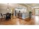 Charming kitchen with granite counters, stainless steel appliances, and adjacent breakfast nook and entryway at 603 Goal Kick Dr, Fuquay Varina, NC 27526