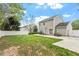 A spacious backyard features a patio, dining set, and ample room for outdoor activities at 622 Twain Town Dr, Knightdale, NC 27545
