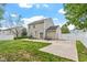 Spacious backyard with a patio, lawn, and privacy fence, perfect for outdoor activities at 622 Twain Town Dr, Knightdale, NC 27545