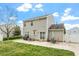 A well-maintained backyard with a patio area, grill, and lawn perfect for entertaining at 622 Twain Town Dr, Knightdale, NC 27545