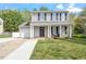 Beautiful home with a well-manicured lawn and an attached single car garage at 622 Twain Town Dr, Knightdale, NC 27545