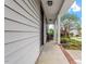 Covered front porch with seating and lovely landscaping for relaxing outdoors at 622 Twain Town Dr, Knightdale, NC 27545