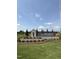 Community sign with stone accents and landscaping at 705 Compeer Way # 31, Rolesville, NC 27571