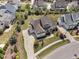 Beautiful aerial view of the home's manicured lawn, lush landscaping, and charming neighborhood at 7825 Green Hope School Rd, Cary, NC 27519